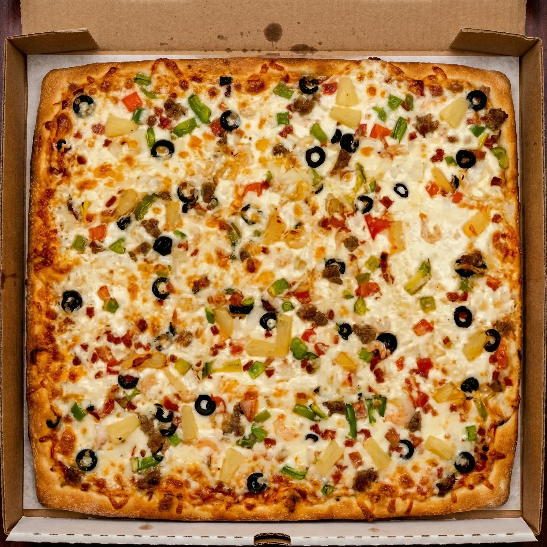 Pepperoni deep dish square pizza in Edgemont, Calgary